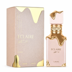 Eclaire Eau de Parfum von Lattafa (100 ml) mit roséfarbener Flasche und goldenen, fließenden Akzenten am Verschluss und Flakonrand. Daneben steht die passende roségoldene Verpackung mit goldenen Details und der Aufschrift „Eclaire“. Das Produkt ist vor hellem Hintergrund freigestellt dargestellt.