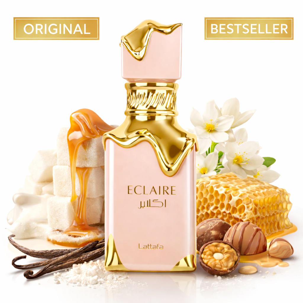 Rosa-goldener Parfumflakon „ECLAIRE“ von Lattafa mit goldenen, fließenden Verzierungen am Verschluss und Flakonhals. Der Duft steht vor einer Komposition aus Zuckerwürfeln mit Honig, Vanilleschoten, Honigwabe, weißen Blüten und Pralinen. Oben im Bild die Hinweise „Original“ und „Bestseller“. Elegante, süß-gourmand Inszenierung auf hellem Hintergrund.