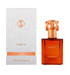 Swiss Arabian Amber 07 Eau de Parfum (50 ml) – rechteckiger, bernsteinfarbener Glasflakon mit kunstvoll verziertem goldfarbenem Verschluss, neben weiß strukturierter Verpackung mit kupferfarbenem Logo und Schriftzug.